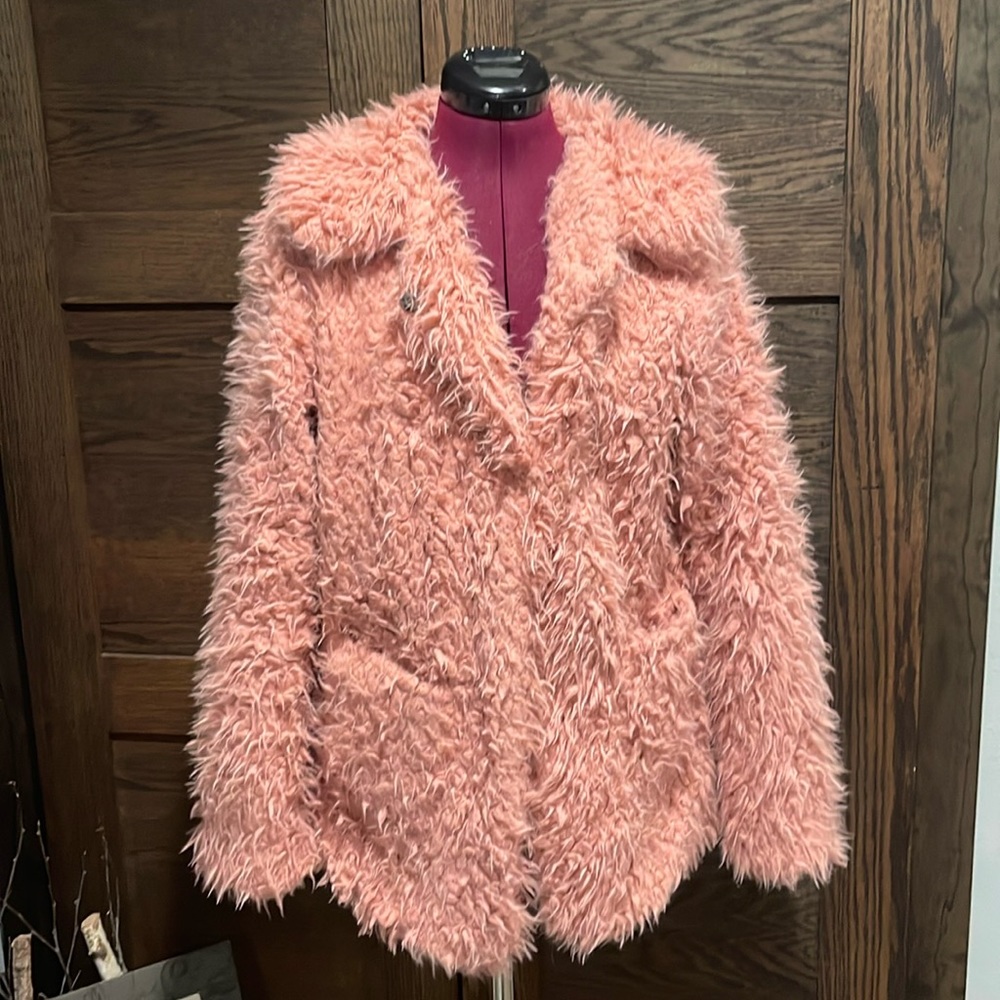 Pink, fuzzy jacket